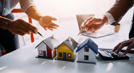 Real estate agent and customer signing contract to buy house, insurance or loan real estate.rent a house,get insurance or loan real estate or property.の写真素材