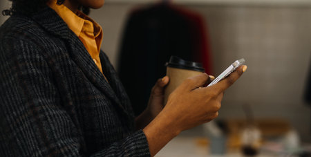 Entrepreneur Asian businessman and businesswoman discussing new business project in tablet in modern Meeting In Modern Office, Asian business casual concept.の写真素材