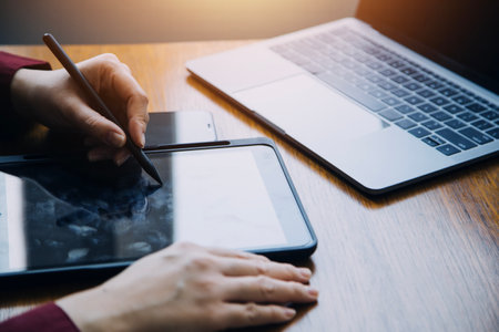 Document Businessman working modern computer Document Management System (DMS), Virtual online documentation database and process automation to efficiently manage files,の写真素材