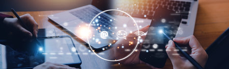 Contact us or Customer support hotline people connect. Businessman using a laptop and touching on...