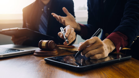 Businessman and Male lawyer or judge consult having team meeting with client, Law and Legal services concept.の写真素材