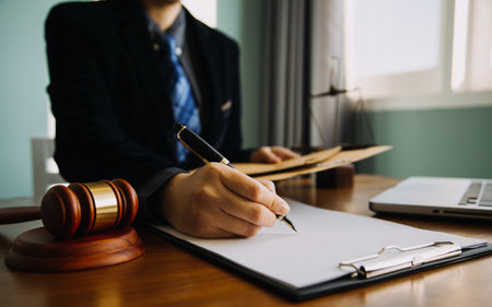 Businessman and Male lawyer or judge consult having team meeting with client, Law and Legal services concept.の写真素材