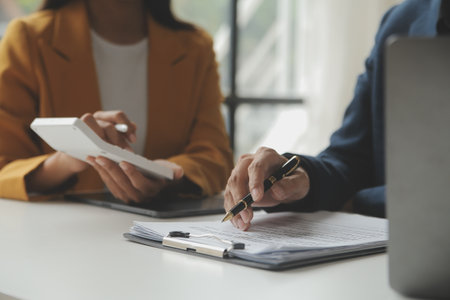 Financial Business team present. Business man hands hold documents with financial statistic stock photo, discussion, and analysis report data the charts and graphs. Finance Financial conceptの写真素材