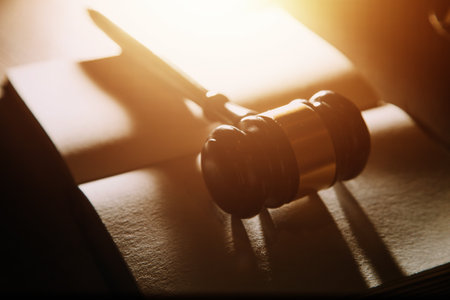 Business and lawyers discussing contract papers with brass scale on desk in office. Law, legal services, advice, justice and law concept picture with film grain effectの写真素材