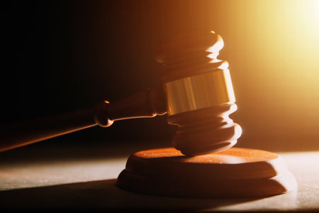 Business and lawyers discussing contract papers with brass scale on desk in office. Law, legal services, advice, justice and law concept picture with film grain effectの写真素材