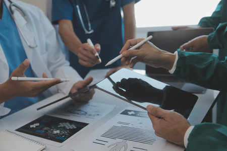 international team of professional doctors having a meeting in conference room at the modern hospital. Healthcare and medical development concept.の写真素材