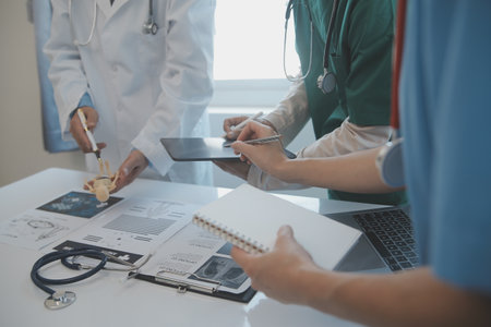 international team of professional doctors having a meeting in conference room at the modern...