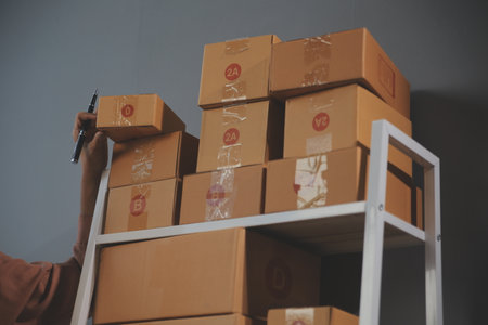 Starting small businesses SME owners female entrepreneurs Write the address on receipt box and check...