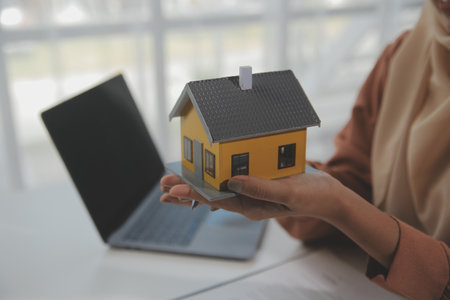 Real estate agent and customer signing contract to buy house, insurance or loan real estate.rent a house,get insurance or loan real estate or property.の写真素材