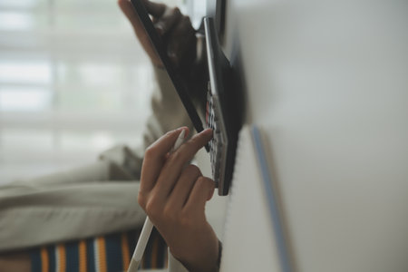 Businesswoman or accountant working Financial investment on calculator, calculate, analyze business and marketing growth on financial document data graph, Accounting, Economic, commercial concept.の写真素材