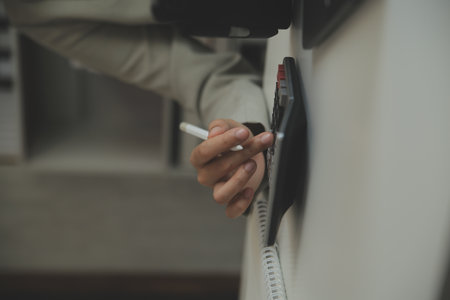 Businesswoman or accountant working Financial investment on calculator, calculate, analyze business and marketing growth on financial document data graph, Accounting, Economic, commercial concept.の写真素材