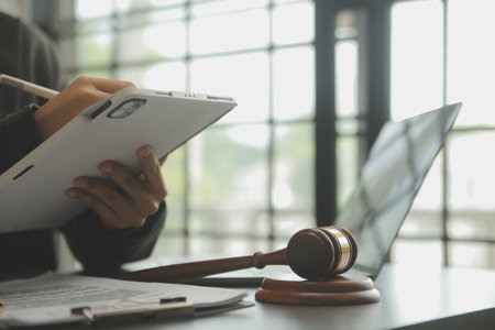 Customer service good cooperation, Consultation between a Businessman and Male lawyer or judge consult having team meeting with client, Law and Legal services concept.の写真素材