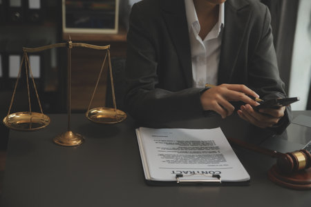 Customer service good cooperation, Consultation between a Businessman and Male lawyer or judge consult having team meeting with client, Law and Legal services concept.の写真素材