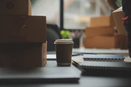Business woman start up small business entrepreneur SME success .freelance woman working at home with Online Parcel delivery. SME and packaging deliveryconceptの写真素材