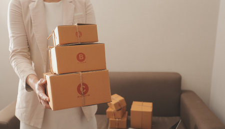 Business woman start up small business entrepreneur SME success .freelance woman working at home with Online Parcel delivery. SME and packaging deliveryconceptの写真素材