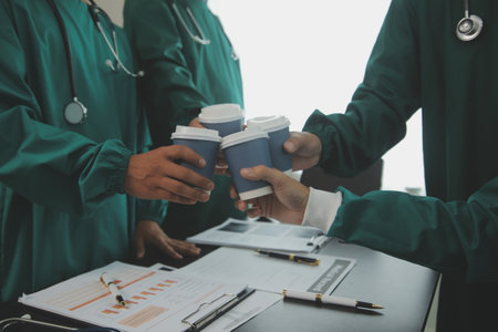Doctor and female patient meeting at the hospital and shaking hands, healthcare and medicine bannerの写真素材
