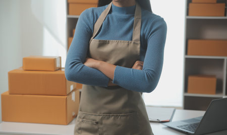 Business woman start up small business entrepreneur SME success .freelance woman working at home with Online Parcel delivery. SME and packaging deliveryconceptの写真素材