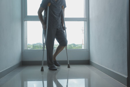 Physiotherapist is doing physical therapy for a patient, the patient has body aches due to overwork and has undergone treatment and physiotherapy with a professional physiotherapist.の写真素材