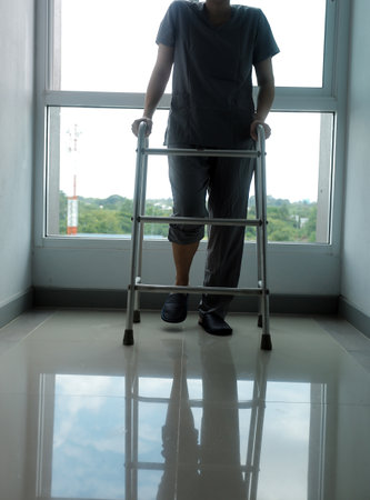 Physiotherapist is doing physical therapy for a patient, the patient has body aches due to overwork and has undergone treatment and physiotherapy with a professional physiotherapist.の写真素材