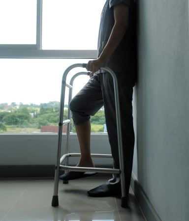 Physiotherapist is doing physical therapy for a patient, the patient has body aches due to overwork and has undergone treatment and physiotherapy with a professional physiotherapist.の写真素材