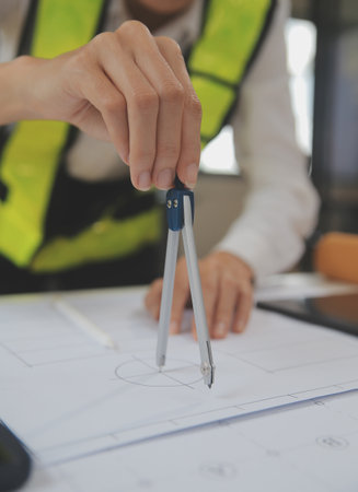 Engineer Teamwork Meeting, Drawing working on blueprint meeting for project working with partner on...
