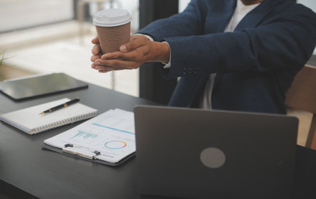 Team of business people working together in the meeting room office, teamwork background charts and graphs banner, double exposure successful teamwork,business planning concept.の写真素材