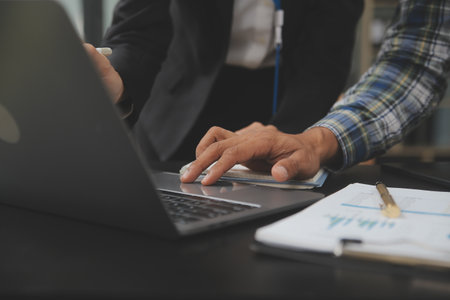 Audit concept,Administrator business man financial inspector and secretary making report calculating...