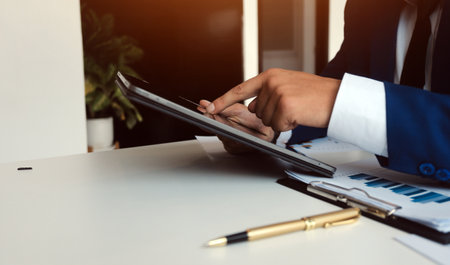 Business Documents, Auditor businesswoman checking searching document legal prepare paperwork or report for analysis TAX time,accountant Documents data contract partner deal in workplace officeの写真素材