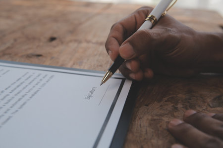 Close up view of job interview in office, focus on resume writing tips, employer reviewing good cv of prepared skilled applicant, recruiter considering application, hr manager making hiring decisionの写真素材