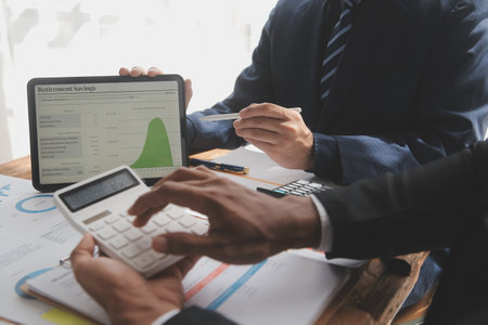 Team of business people working together in the meeting room office, teamwork background charts and graphs banner, double exposure successful teamwork,business planning concept.の写真素材