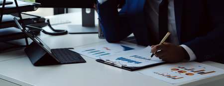 Team of business people working together in the meeting room office, teamwork background charts and...