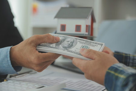 Real estate agent and customer signing contract to buy house, insurance or loan real estate.rent a...