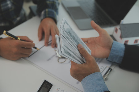 Real estate agent and customer signing contract to buy house, insurance or loan real estate.rent a house,get insurance or loan real estate or property.の写真素材