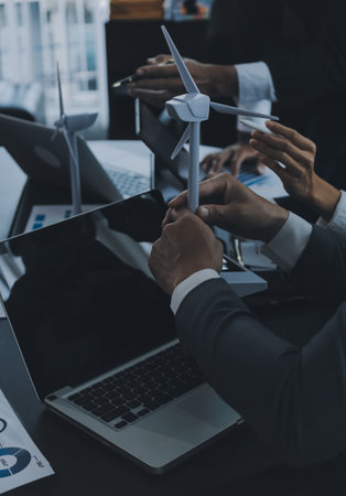 Close up of Business team analyzing income charts and graphs with modern laptop computer. Business analysis and strategy concept.の写真素材