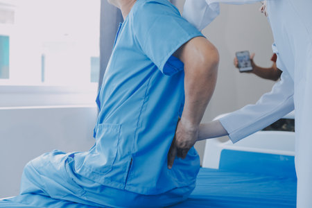 Patient doing some special exercises under supervision in a room