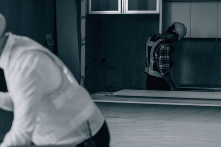 Entrepreneurs and business people conference in modern meeting room, happy multiracial coworkers have fun cooperating working together at office meeting, asian teamwork conceptの写真素材