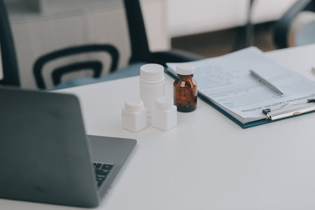 Doctor giving hope. Close up shot of young female physician leaning forward to smiling elderly lady patient holding her hand in palms. Woman caretaker in white coat supporting encouraging old personの写真素材