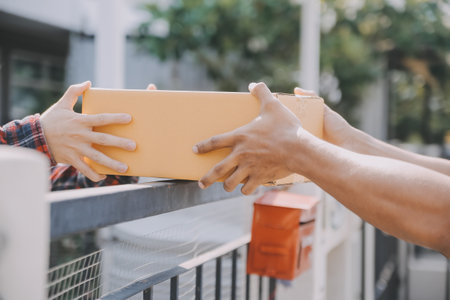 Business woman start up small business entrepreneur SME success .freelance woman working at home with Online Parcel delivery. SME and packaging deliveryconceptの写真素材