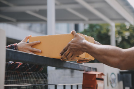 Business woman start up small business entrepreneur SME success .freelance woman working at home with Online Parcel delivery. SME and packaging deliveryconceptの写真素材