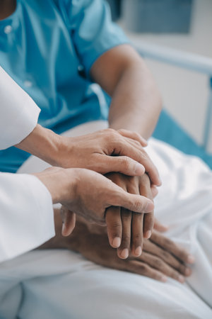 Doctors do it for the health of it. Shot of a mature doctor examining his patient who is concerned about his knee.の写真素材