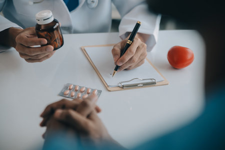 Doctors do it for the health of it. Shot of a mature doctor examining his patient who is concerned about his knee.の写真素材