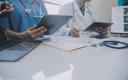 international team of professional doctors having a meeting in conference room at the modern hospital. Healthcare and medical development concept.の写真素材