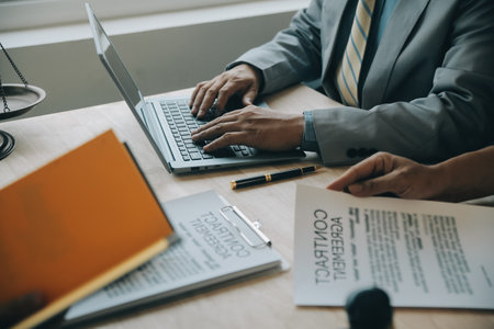 Customer service good cooperation, Consultation between a Businessman and Male lawyer or judge consult having team meeting with client, Law and Legal services concept.の写真素材