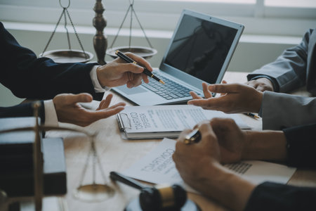 Customer service good cooperation, Consultation between a Businessman and Male lawyer or judge consult having team meeting with client, Law and Legal services concept.の写真素材