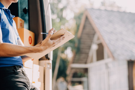 Business woman start up small business entrepreneur SME success .freelance woman working at home with Online Parcel delivery. SME and packaging deliveryconceptの写真素材