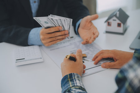 Real estate agent and customer signing contract to buy house, insurance or loan real estate.rent a house,get insurance or loan real estate or property.の写真素材