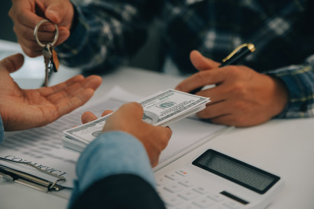 Real estate agent and customer signing contract to buy house, insurance or loan real estate.rent a...