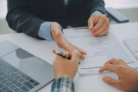 Real estate agent and customer signing contract to buy house, insurance or loan real estate.rent a house,get insurance or loan real estate or property.の写真素材