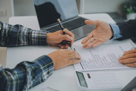 Real estate agent and customer signing contract to buy house, insurance or loan real estate.rent a house,get insurance or loan real estate or property.の写真素材
