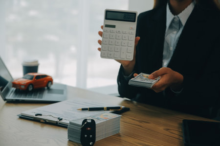 Salesman send key to customer after good deal agreement, successful car loan contract buying or...